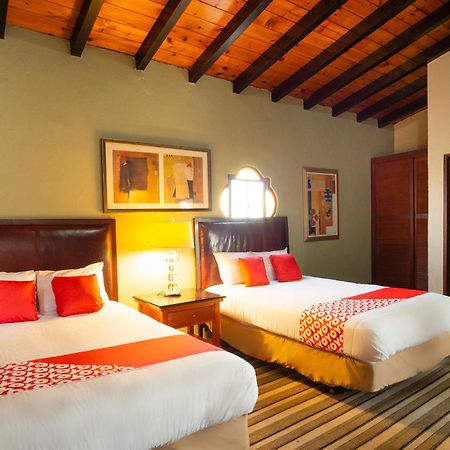 Oyo Hotel Hacienda Don Luis, Rosarito Eksteriør bilde A typical hotel room